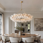 Talia Modern Ring Chandelier 63 inch above a round dining table