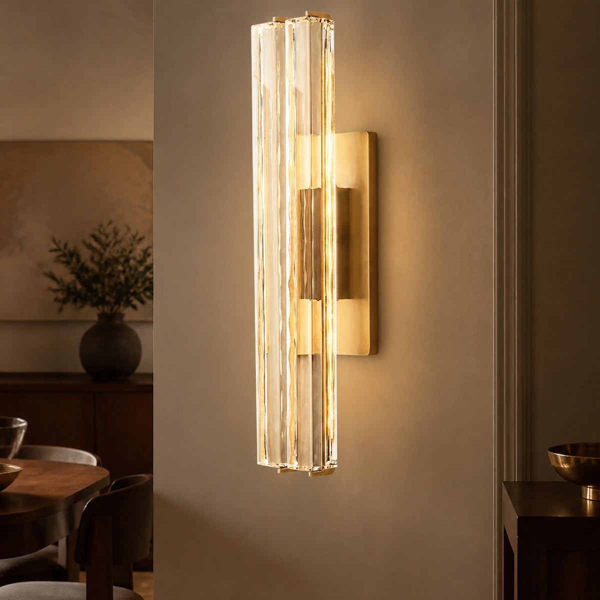 Audubon Modern Crystal Double Sconce in a warm dining interior