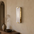 Modern Alabaster Grand Sconce in a warm hallway interior