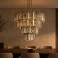 Delsa Modern Smoke Round Chandelier in a warm dining interior