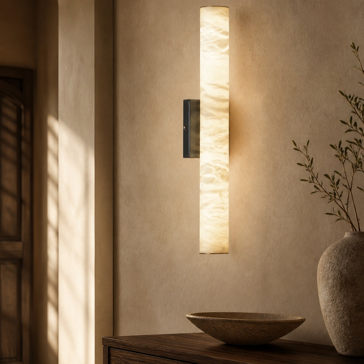 Modern Luxury Vertical Alabaster Wall Sconce in a warm hallway interior