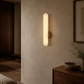 Modern Alunari Wall Sconce in a warm hallway interior