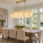 Calamette Alabaster Rectangular Chandelier 60" installed in a naturally lit American villa interior