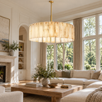 Calamette Alabaster Round Chandelier 60" installed in a naturally lit American villa interior