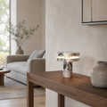 Danae Cordless Marble Table Lamp on a walnut console