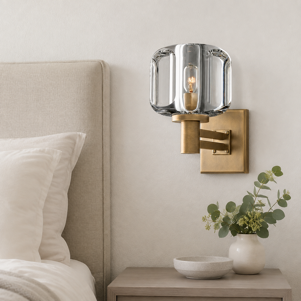 Demaret Glass Wall Sconce installed beside a neutral upholstered bed