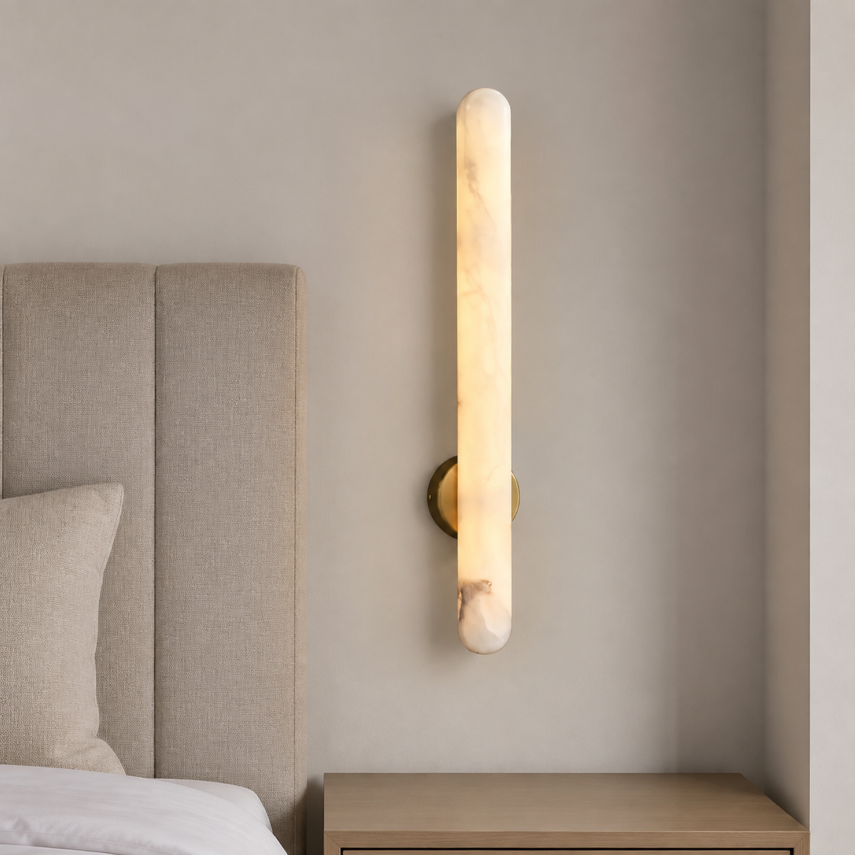 Kalliope Marble and Copper Wall Sconce installed beside a bed