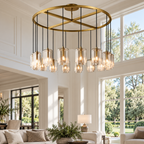 Lacour round clear-glass chandelier in a high-ceiling living room
