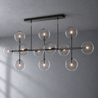 Sierra 72-inch matte black linear chandelier angled product view on a textured gray background