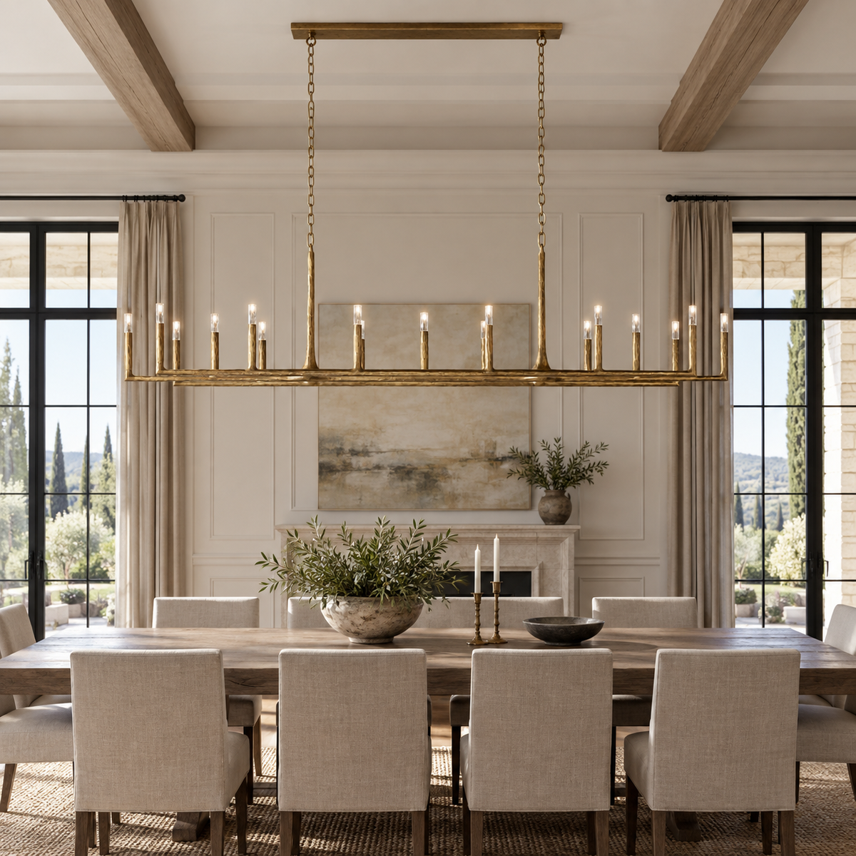 Thaddeus 96-inch brass linear chandelier above a large dining table