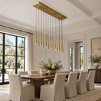 Aquitaines Linear Chandelier 72" installed in a naturally lit spacious American villa