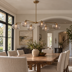 Cabrette Clear/Amber Glass Mobile Linear Chandelier 60″/72" installed in a naturally lit spacious American villa