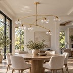 Cabrette Clear/Amber Glass Mobile Round Chandelier 48″/60"/72" installed in a naturally lit spacious American villa