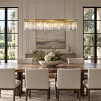 49-inch Odeon single-tier crystal linear chandelier above a dining table in a spacious home